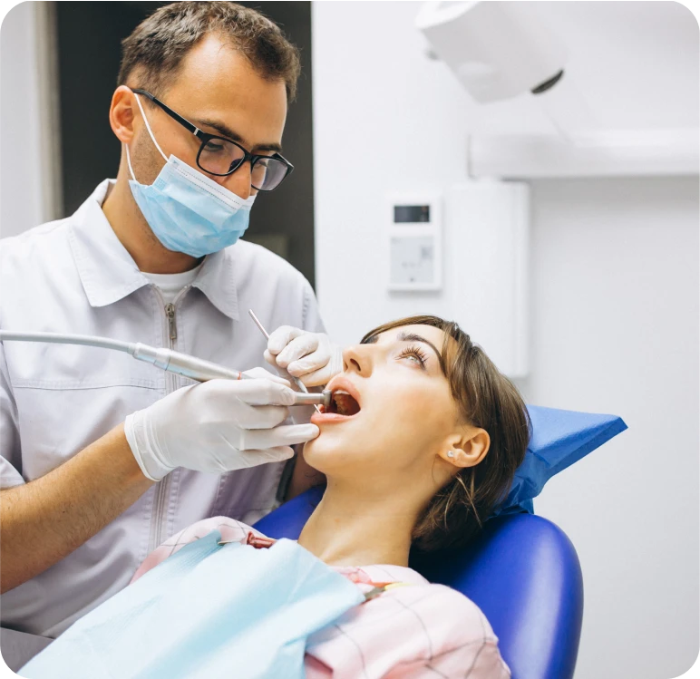 dentist checking his patient teeth | Dentulu